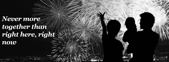 a silhouette of a person with fireworks in the background