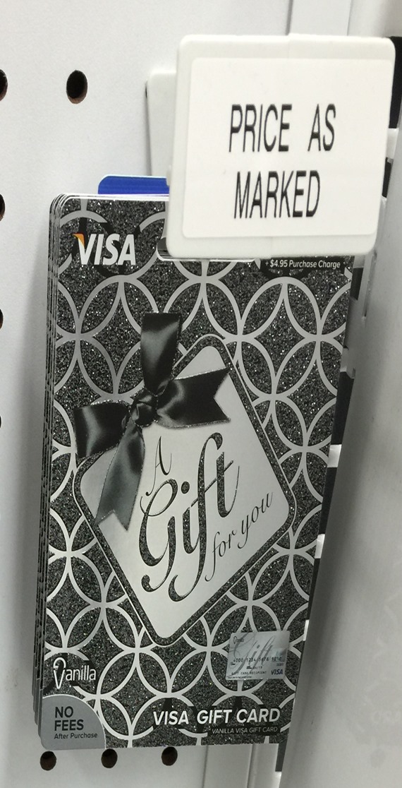 a gift card with a black ribbon and a white tag