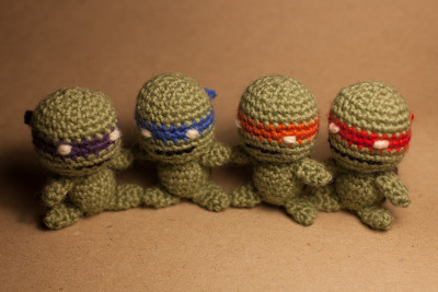 a group of knitted toys