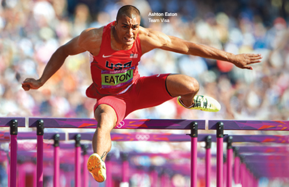 a man jumping over bars