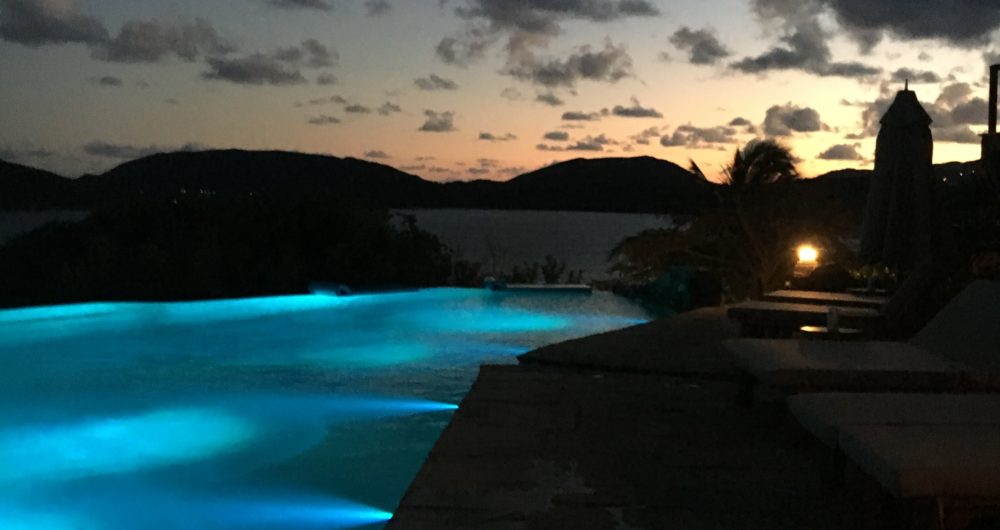 a pool with lights on