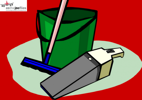 a green bucket and a mop