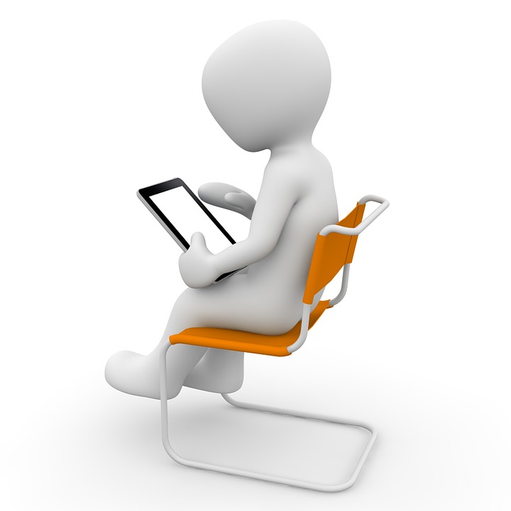 a cartoon character sitting on a chair using a tablet