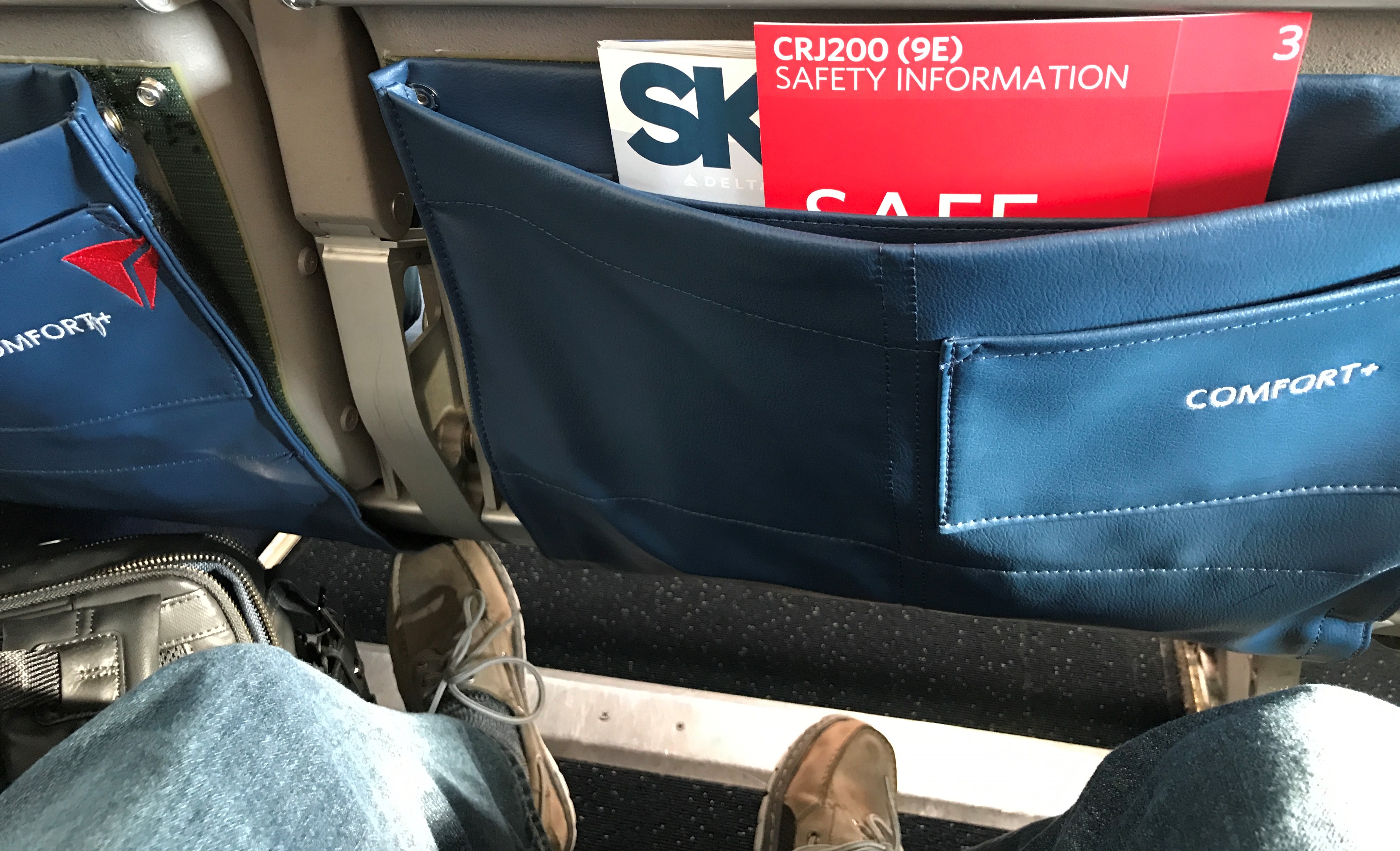 a blue pocket in a seat