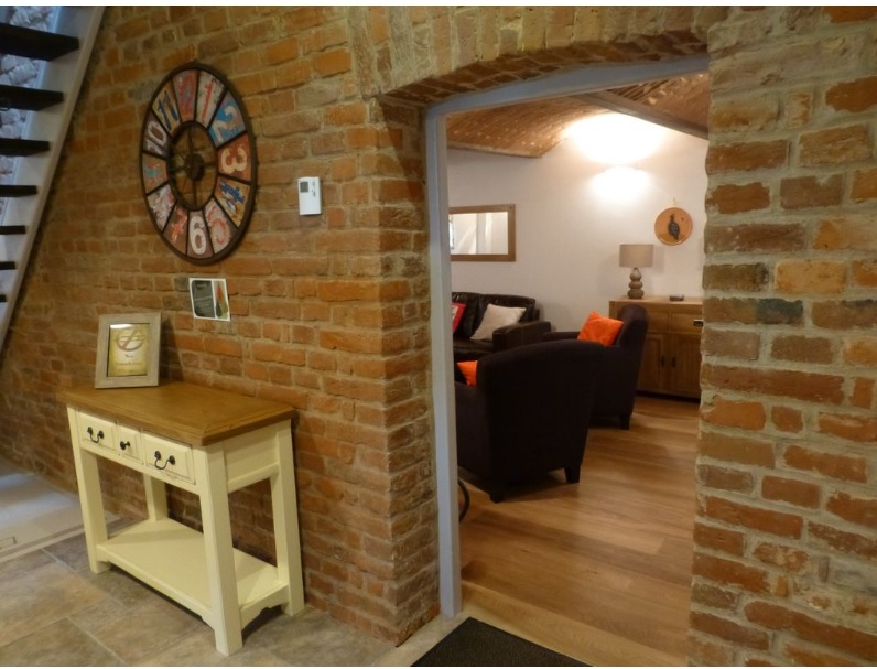 a room with brick walls and a table