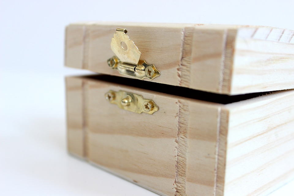a wooden box with a lock
