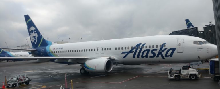 a white airplane on a tarmac