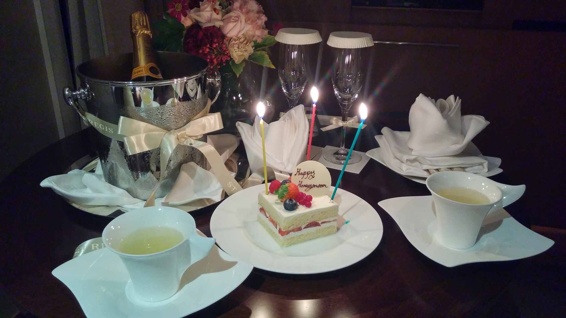 a cake with candles on a table