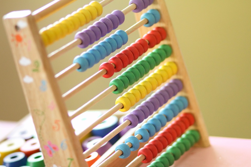 a colorful abacus with wooden sticks