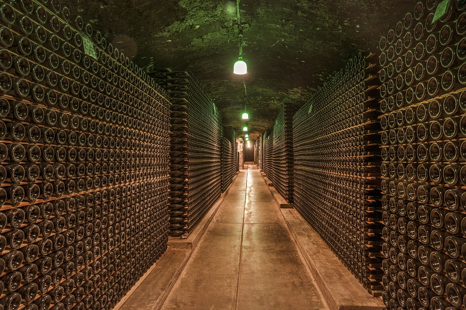 a hallway with rows of bottles