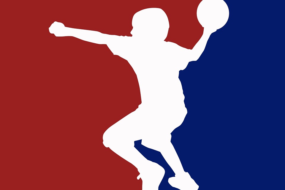 a silhouette of a boy throwing a ball