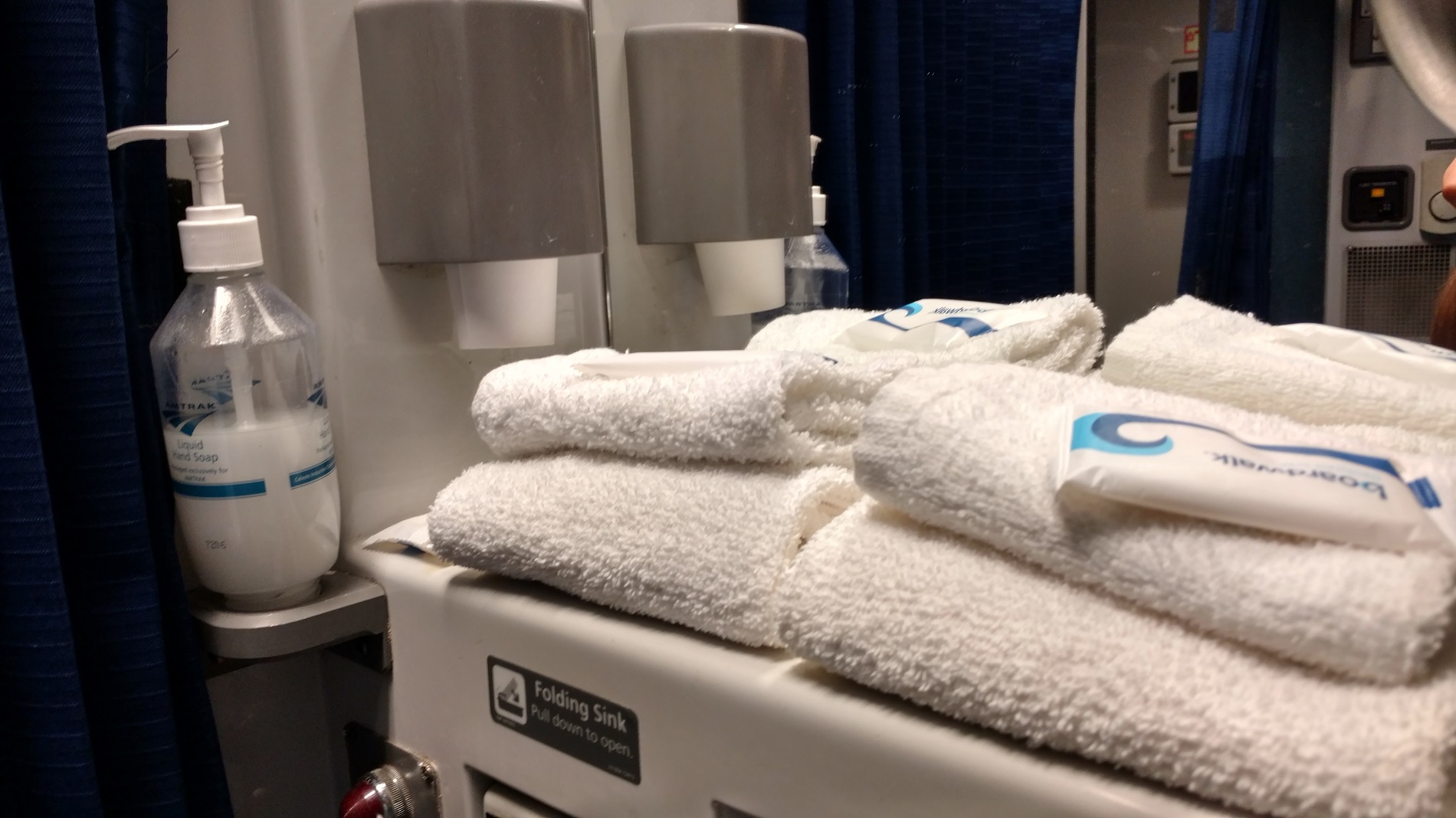 a stack of towels on a machine