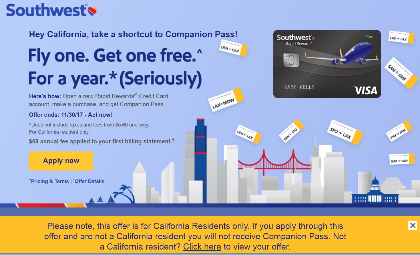 a credit card with a city skyline and a golden gate bridge