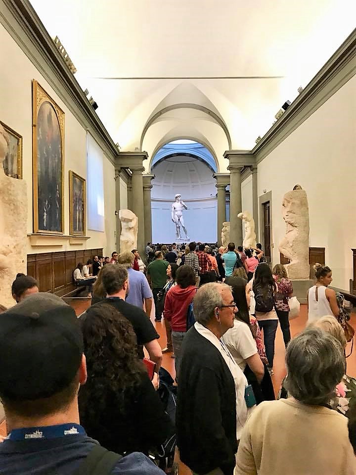 a group of people in a museum