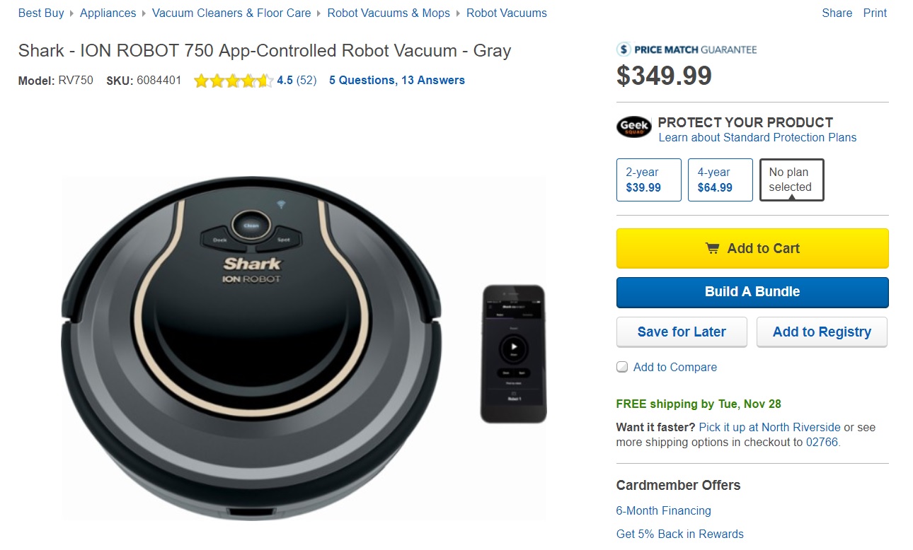 a robot vacuum cleaner and a phone