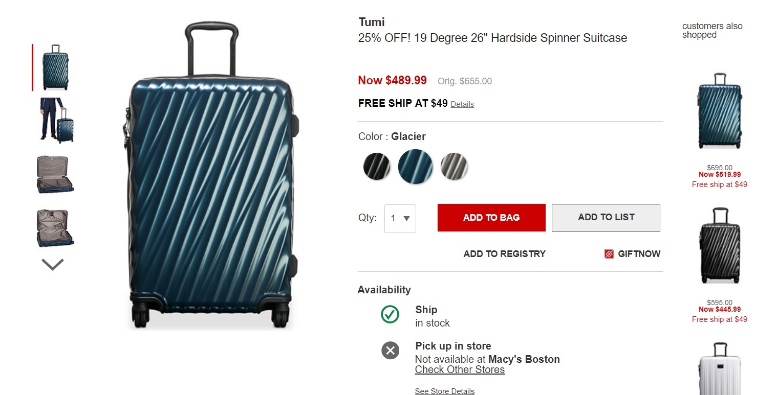 a blue suitcase with black wheels