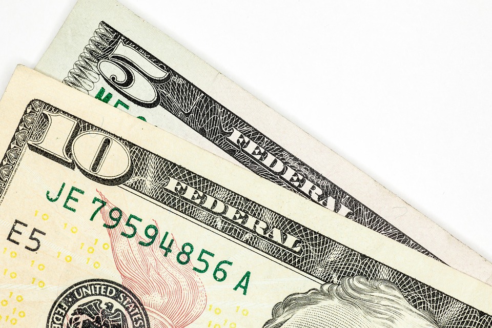 close up of money on a white background