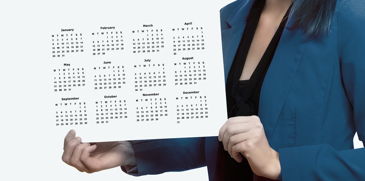 a woman holding a calendar