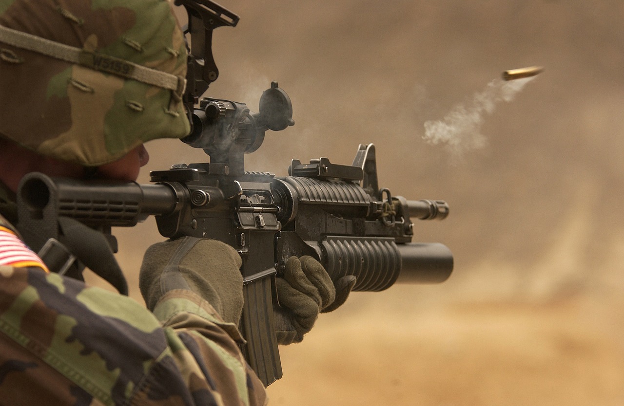a soldier aiming a gun