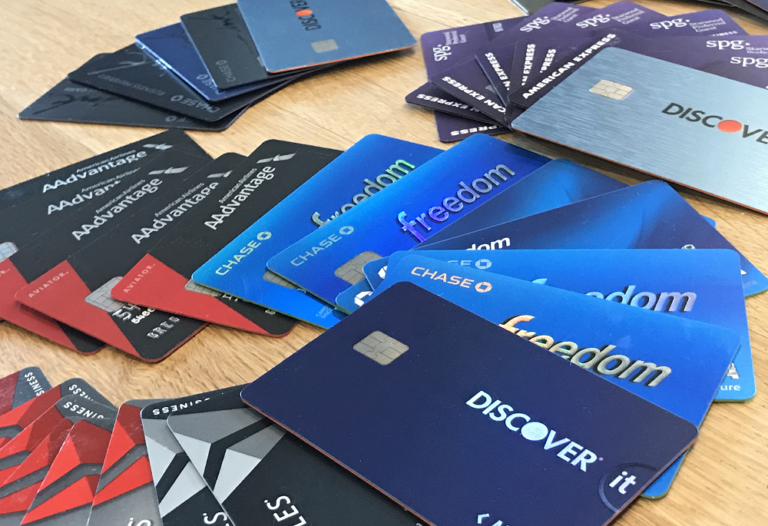 a group of credit cards on a table