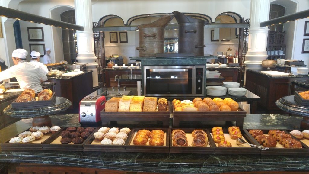 a counter with pastries and pastries on it