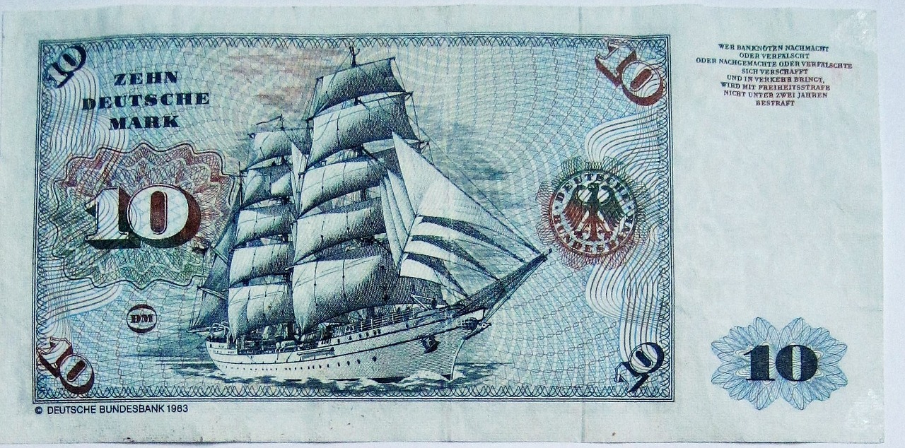a paper money note with a ship
