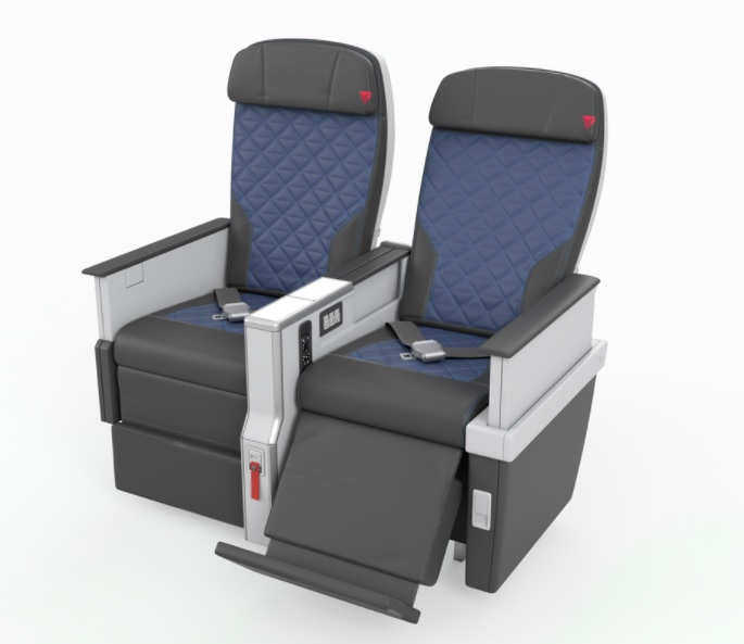 a pair of seats with armrests