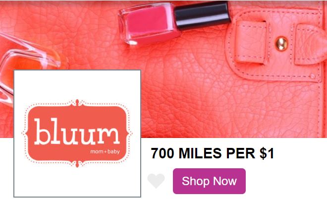 a pink purse with a bottle of nail polish