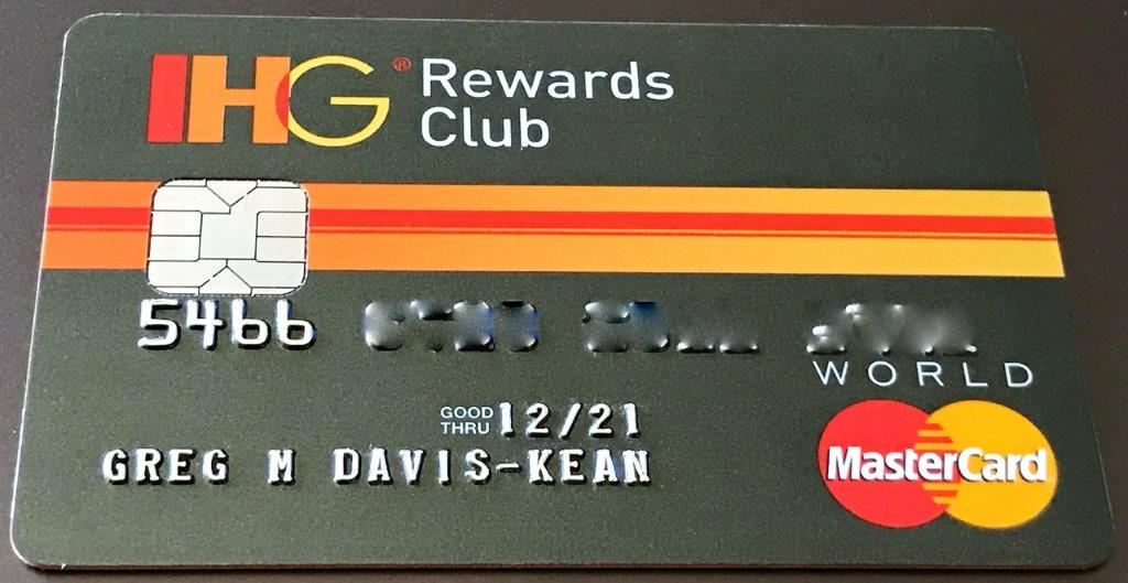 a credit card with a red and yellow stripe