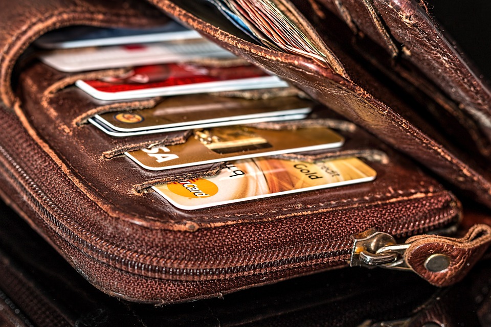 a wallet with credit cards and a wallet