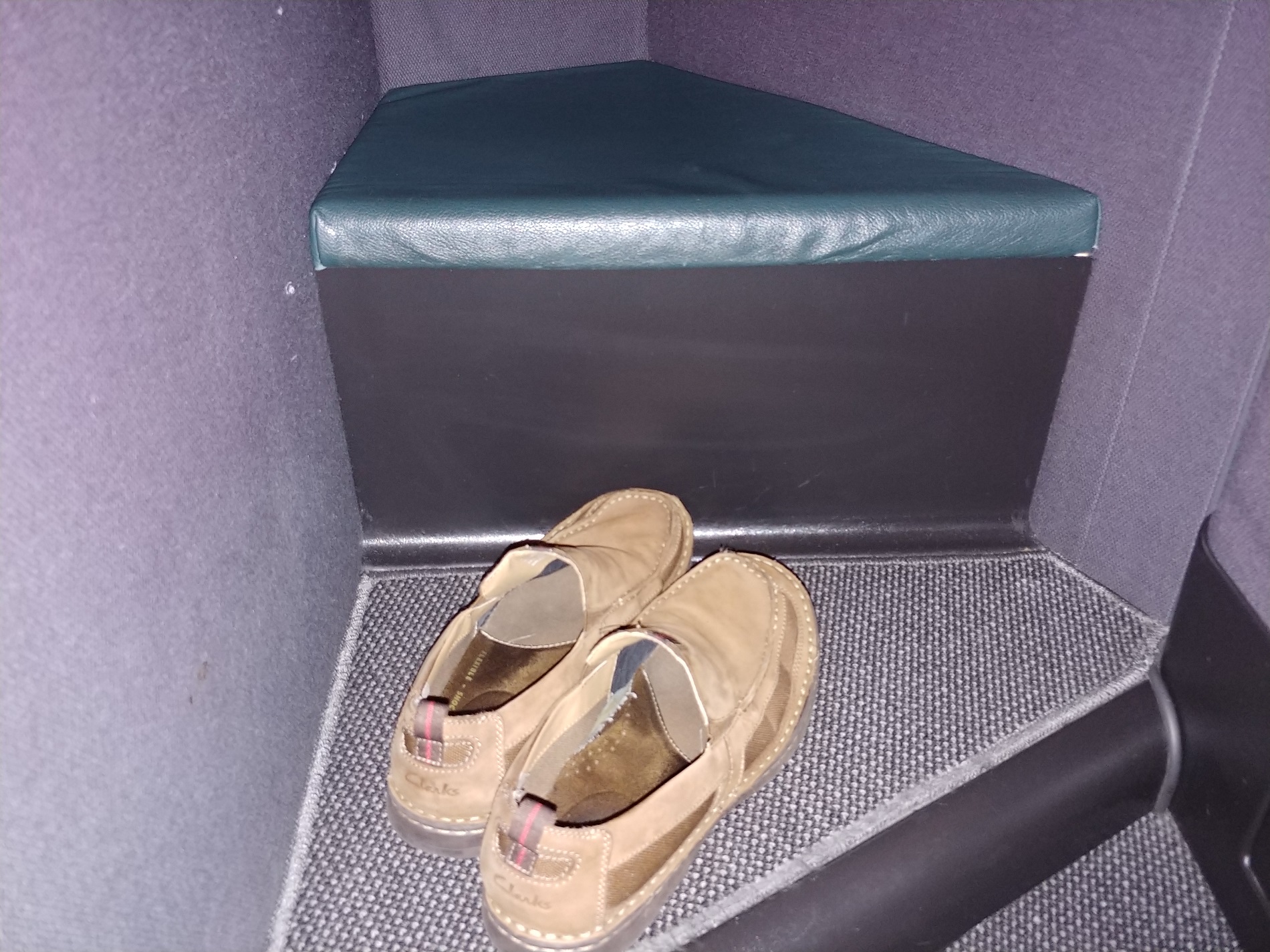 a pair of shoes on a corner