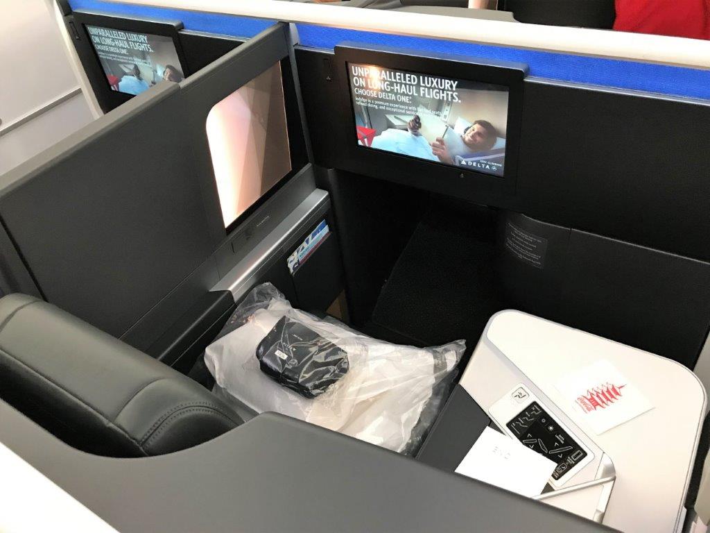 a tv on the back of a seat