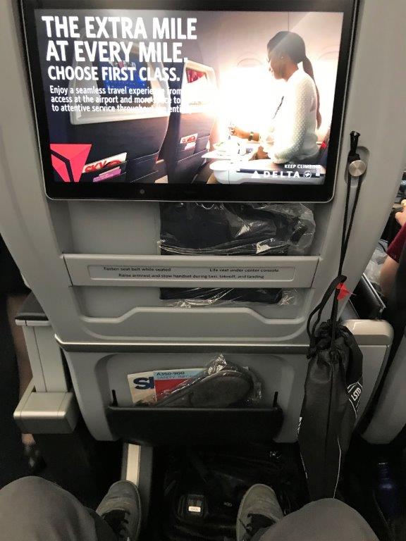 a tv on the side of an airplane