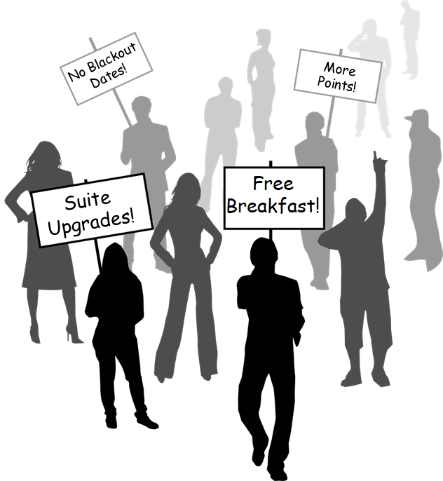 silhouettes of people holding signs