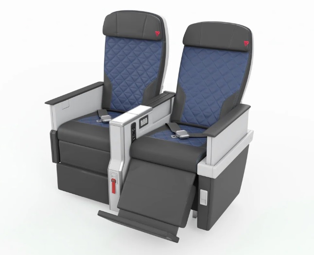 a pair of seats with armrests