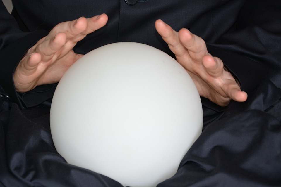 a person holding a white ball