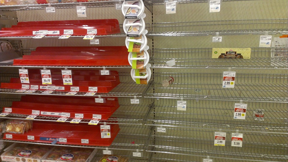 empty shelves with food items on them