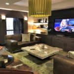 a living room with a television and a couch