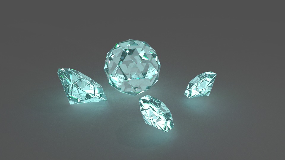 a group of diamonds on a grey background