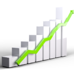 a white cubes with a green arrow going up