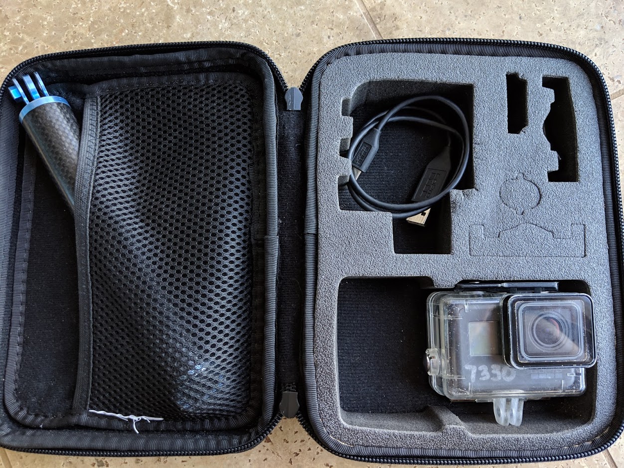 a black case with a small camera inside