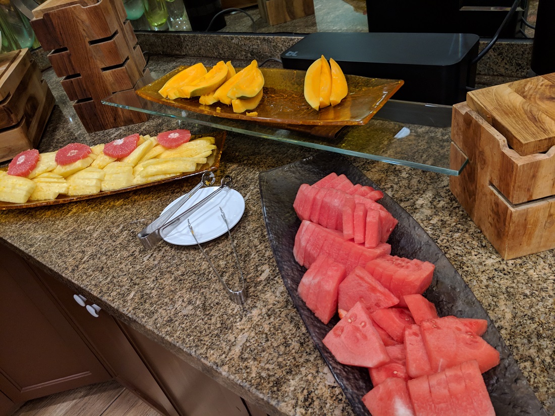 a plate of fruit on a counter