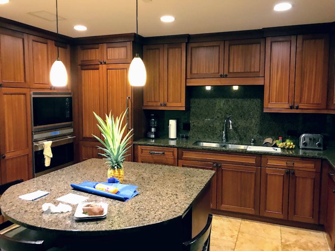 a kitchen with a pineapple on a table