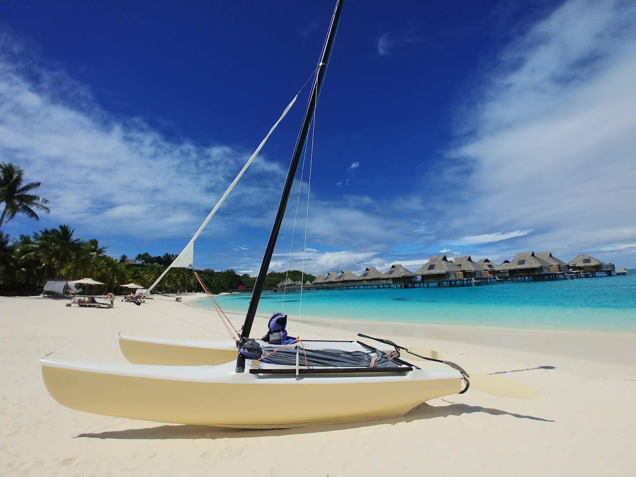 a sailboat on a beach