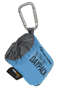 a blue sleeping bag with a black label