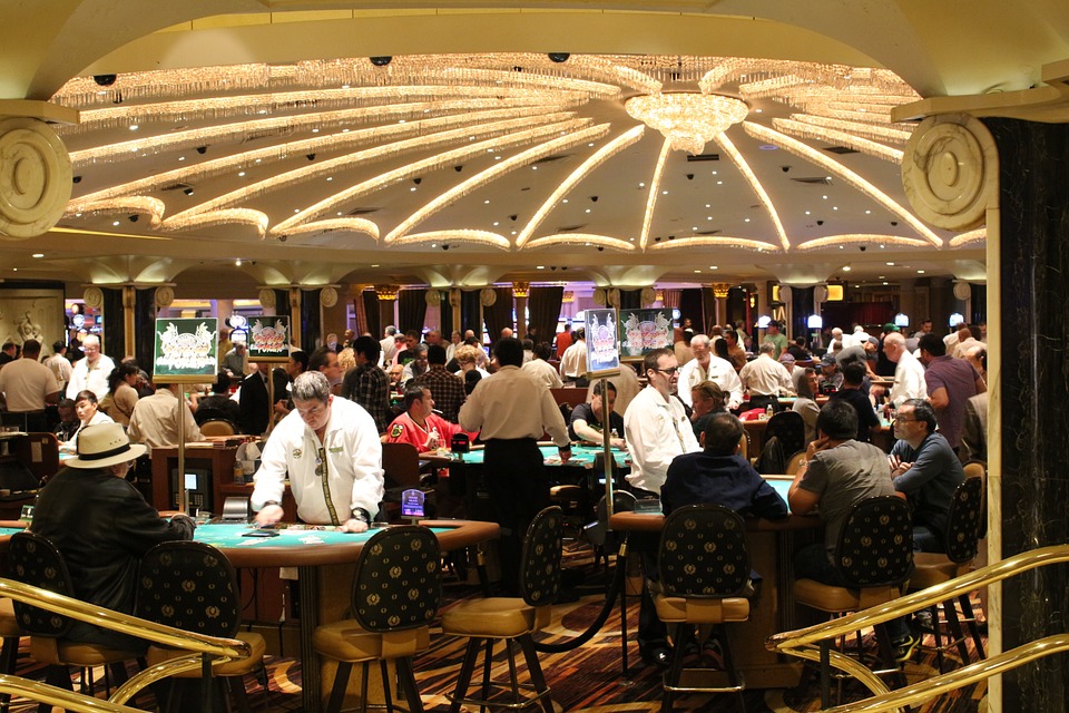 a group of people playing poker in a casino