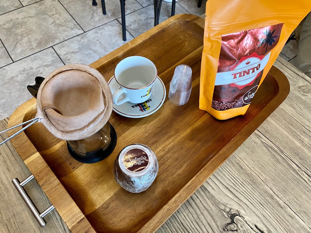 a tray with coffee and other items on it