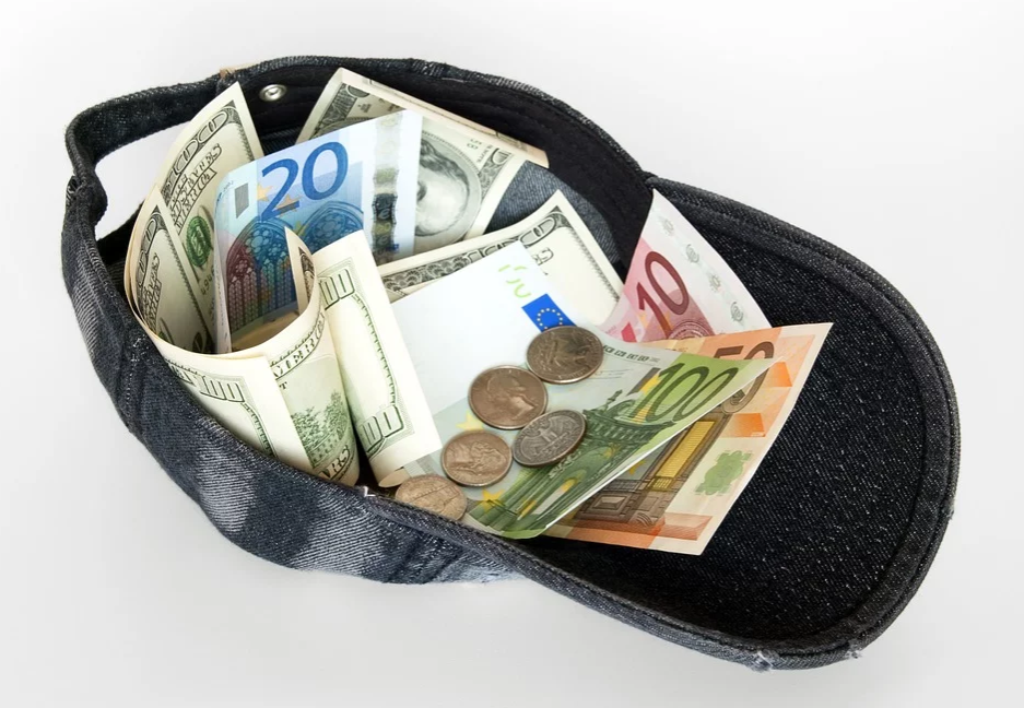 a cap with money in it