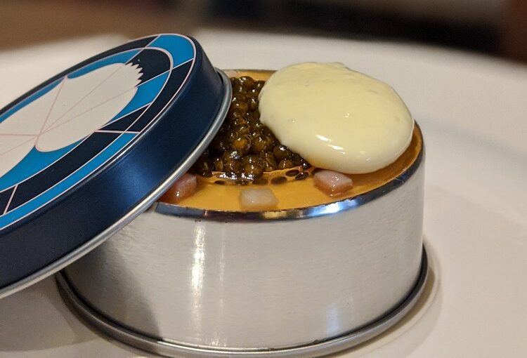 a round container with a lid on top of it