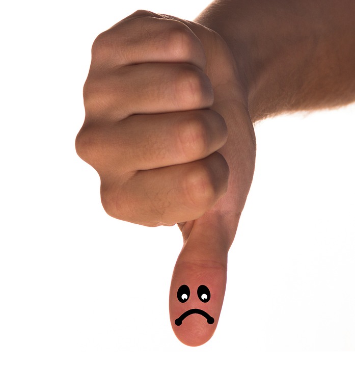 a thumb with a face drawn on it